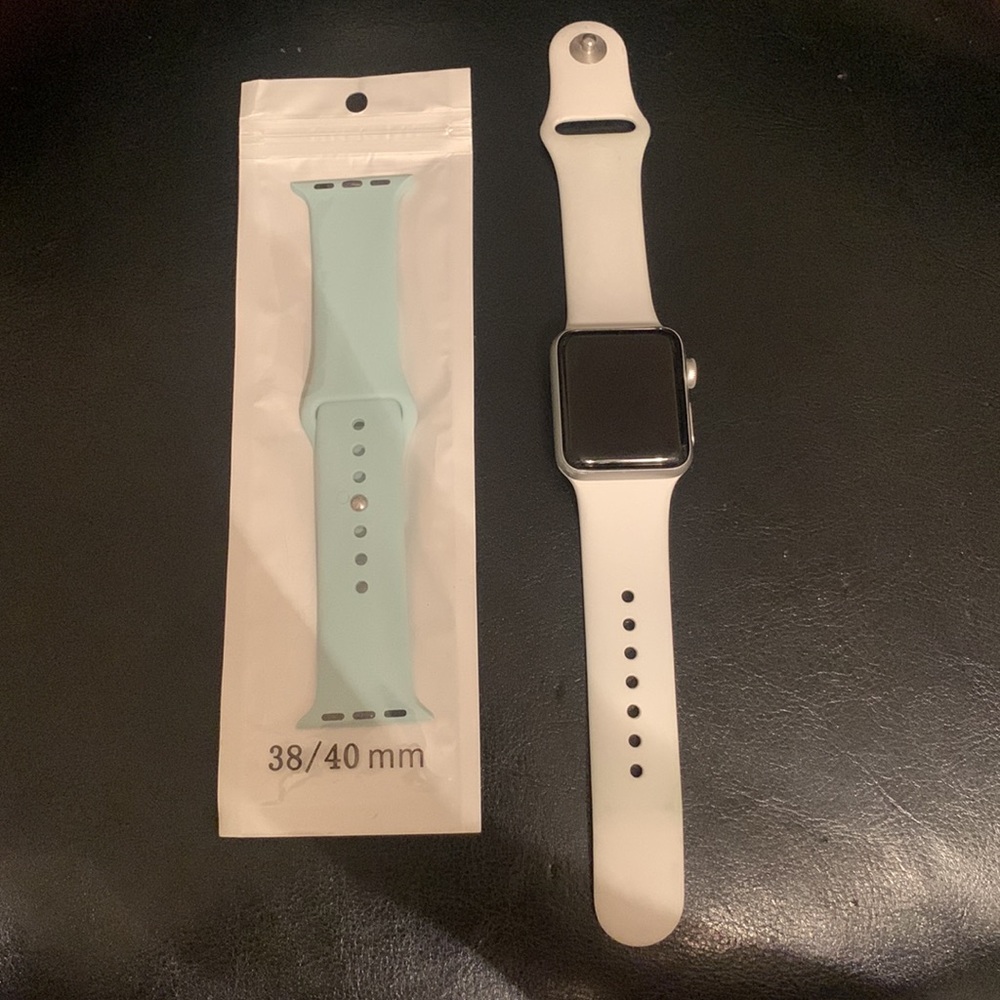 Series 3 Apple watch- comes with white apple band and unused blue band.